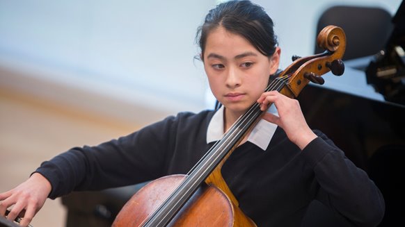 Riya playing cello.jpg